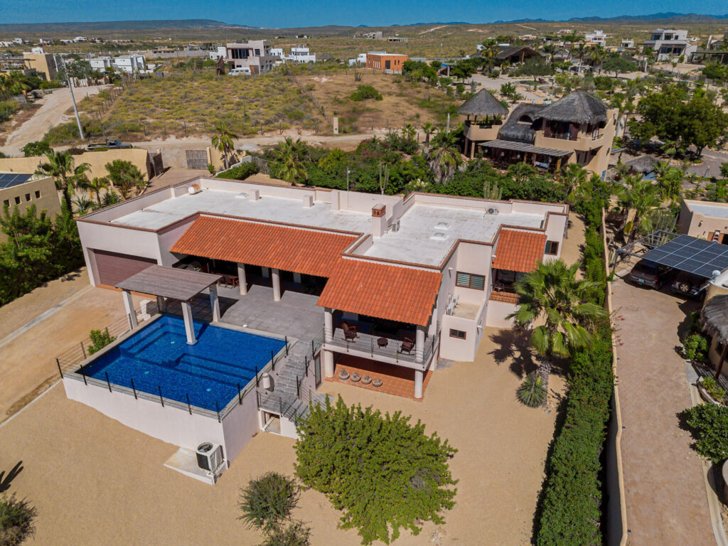 Los Cabos Pescadero Casa Soledad #3 Welcome to Pueblo Pescadero — where desert serenity meets ocean breeze and refined Baja living blends seamlessly with nature. This beautifully designed 3-bedroom, 2.5-bath residence offers the best of coastal comfort just minutes from Cerritos and San Pedrito beaches. Created by architect Hiram Arce, the home merges traditional Mexican craftsmanship with clean, modern lines—showcasing open living spaces filled with natural light and effortless indoor-outdoor flow. All bedrooms are conveniently located on the ground floor for cool, restful nights, while the upper level opens into an expansive great room and two large decks that extend the living space outdoors. The ocean-facing terrace captures panoramic Pacific – Camino a las Playitas, Pacific, BS
