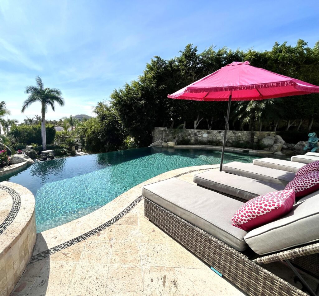 Los Cabos Cerritos Rare opportunity just minutes from Cerritos Beach! This charming Hacienda-style home sits in a fully walled compound with two vehicle gates, side access, and a garage, with ample room to expand. Enjoy a solar-heated pool, hot tub, expansive patios, and gorgeous mature landscaping that creates a private oasis. Incredible ocean and mountain – Ocean Drive, Pacific, BS