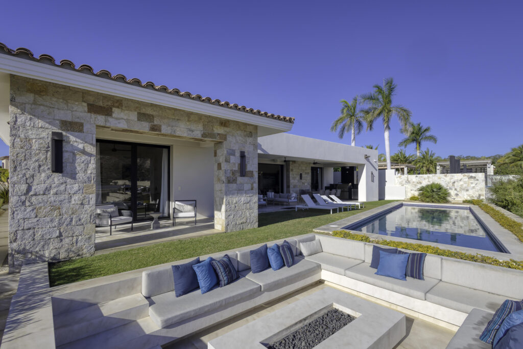 Los Cabos Fundadores Fully remodeled with entertaining in mind, Casa Reino is a stunning Spanish Colonial-style residence located within the double-gated Fundadores community of Puerto Los Cabos. Designed for hosting extended family and friends while maintaining exceptional privacy, this custom-built home blends timeless architecture with modern luxury and efficiency.An expansive pool terrace invites relaxed lounging under the renowned Los Cabos sunshine, complemented by shaded outdoor living and dining areas and multiple interior courtyards that provide privacy for guest suites. A brand-new bar, media, and entertainment room creates the perfect setting for dinner parties and special events.The thoughtful floor plan features a luxurious master suite with soaking tub and indoor/outdoor shower, along with four private guest suites, each positioned for comfort and seclusion. Modern upgrades throughout the home include all-new plumbing, air conditioning, doors, windows, lighting, and furnishings.Designed for efficiency and convenience, Casa Reino is equipped with a solar system, solar pool heater/chiller, and solar heat pump, keeping operating costs low. Additional highlights include an oversized two-car garage with commercial refrigerator and freezer, a new laundry room with dual washer/dryer sets, and a new BBQ cook center with wet bar, icemaker, and refrigeration. The pool has been newly refinished, exterior travertine decking installed, and a complete hurricane shutter system added.Residents of Puerto Los Cabos enjoy 27 holes of Nicklaus and Norman signature golf, with the option to transfer a golf membership at the purchaser's cost. Membership also includes access to tennis and pickleball courts. Fundadores HOA fees include exclusive access to the Fundadores Beach Club, featuring an oceanfront infinity pool, Jacuzzi, fitness center, event lawn, restaurant, and spa services.Ideally located just 5 minutes from the Puerto Los Cabos Marina, 10 minutes from downtown San José del Cabo, and 30 minutes from Los Cabos International Airport, Casa Reino offers effortless access to world-class dining, shopping, and lifestyle amenities.Special Features & UpgradesSolar system in placeSolar pool heater and chillerNewly remodeled pool with new finishesNew exterior travertine deckingNew bar / media / family roomNew laundry room with double washer & dryersNew air conditioning throughoutNew furnishingsNew kitchen appliances: refrigerator, two dishwashers, ice maker, beverage fridge & drawersNew sinks and faucets in kitchenSonos sound systemNew doors and windowsNew hurricane protection systemNew interior and exterior lightingCommercial refrigerator and freezer in garageNew countertops and cabinetry in kitchenette and bath at Guest Casita #4 – Palmilla Estates 58, San Jose Corridor, San Jose Corridor, BS