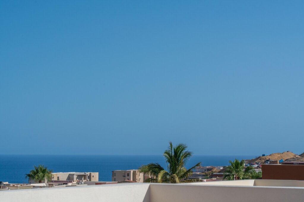 Los Cabos Fundadores Villa Maralta 62 offers contemporary coastal living in Puerto Los Cabos.This newly built 5-bedroom residence is designed around seamless indoor-outdoor flow, with main living areas opening toward the terrace, pool, and ocean – SN Via de Plomo Lot 12, Pacific, BS