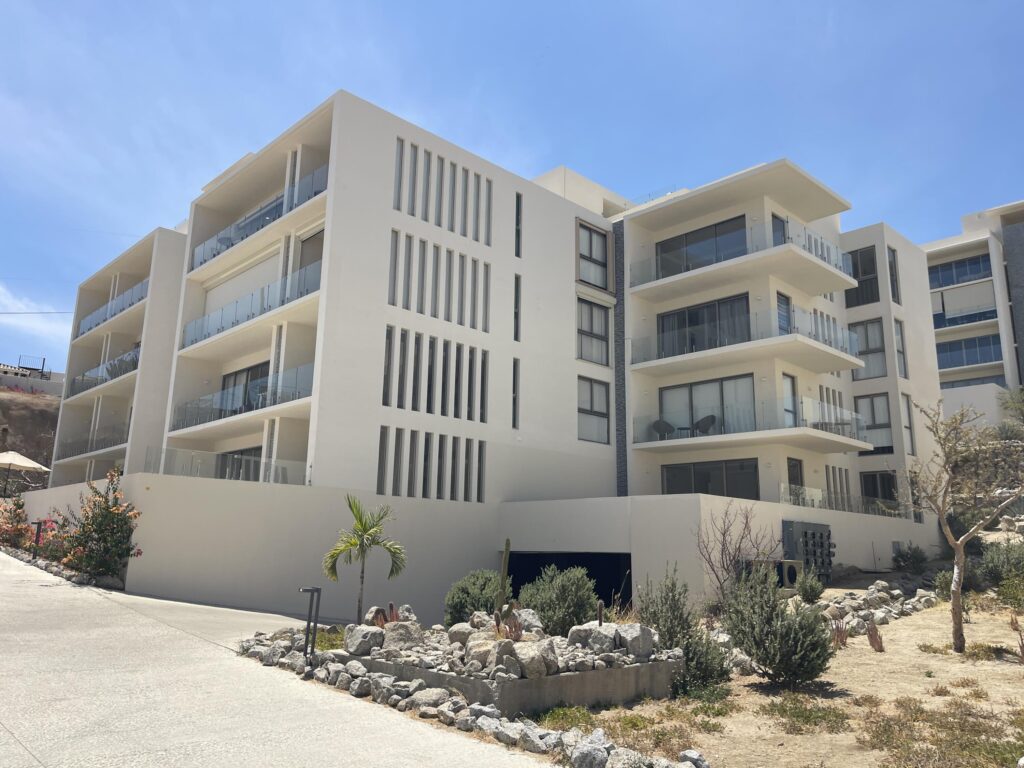 Los Cabos Cabo Costa POOL INCLUDED! This stunning 2-bedroom condo with huge deck is located on the first level in the Balandra Tower of Cabo Costa . Cabo Costa is the newest community that blends its arquitectural designs with nature. This unit has been meticulously designed and comprises two end-suite bedrooms. The property interior is designed in neutral tones to create a modern, welcoming and luxurious home yet retaining its original features. Amenities such as a Club House, Infinity pool, Gym, sundeck, Kids area, Jacuzzi, Wetbar, Snackbar & Massage area. – Vista Vela ph. 3 penthouse, Cabo Corridor, Cabo Corridor, BS