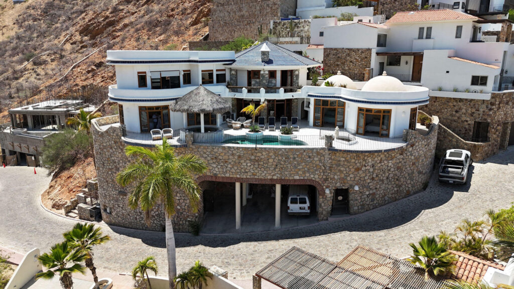 Los Cabos Pedregal Csl Commandingly positioned in the exclusive enclave of Pedregal, Casa El Castillo offers rare walkable proximity to downtown alongside total hillside privacy. This 6-bedroom, 7.5-bathroom architectural estate--originally built by fitness icon Ray Wilson--was masterfully oriented to maximize its vantage point. The result is a breathtaking, unobstructed panorama spanning the Cabo San Lucas Marina, vibrant city lights, and dramatic – 175 Camino Grande, Cabo San Lucas, BS