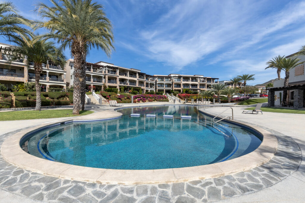 Los Cabos Vista Mare Condo for sale at Vista Mare in Cabo San Lucas, located on the ground floor and ready for delivery. This unit offers 128.03 m² total, distributed in 97.65 m² of interior space and 30.38 m² of terraces, providing comfortable and functional living areas. It features 2 bedrooms, 2 full bathrooms, living room, dining area, equipped kitchen, air conditioning, and a pleasant private patio, ideal for enjoying an exclusive outdoor space. It also includes 1 underground parking space. The development offers amenities such as a gym, 2 swimming pools, jacuzzi, and firepit, perfect for enjoying the Los Cabos lifestyle. An excellent option to live in, vacation, or invest in a high-demand real estate area. – Camino del Parque, Cabo San Lucas, BS
