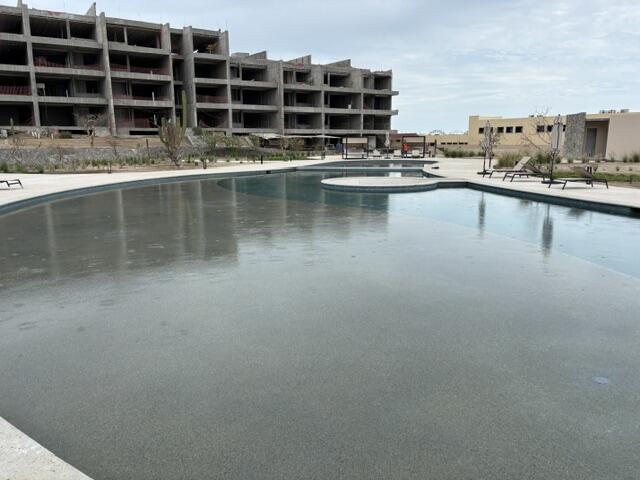 Los Cabos Lumaria Enjoy resort living within a private and gated community, Amenities include a resort style pool, large jacuzzi, state of the art gym, spa treatment rooms and a full-service cafe. This penthouse unit has a pergola for shade over your outdoor dining area, full counter area with a sink, propane hook up for outdoor grill, hook up for hot tub and perimeter lighting for nighttime use. Close to grocery store as well as Home Depot. Driving access to Costco without going on the highway. – Torre Catalina, Cabo Corridor, Cabo Corridor, BS